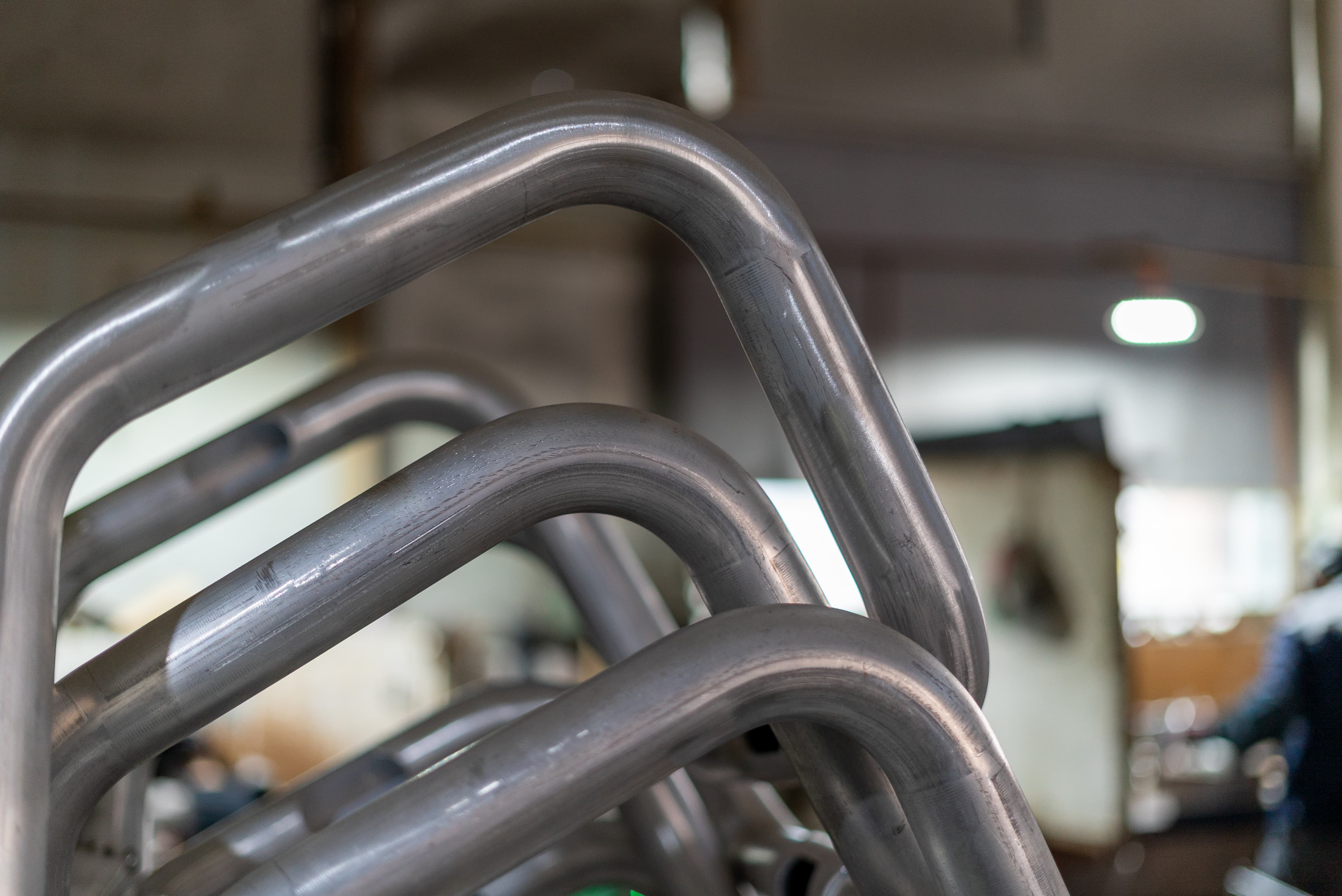 Bent metal tubes prepared for custom OEM assemblies